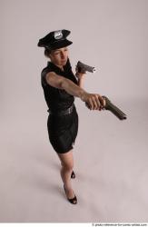 NIKITA POLICEWOMAN WITH TWO GUNS